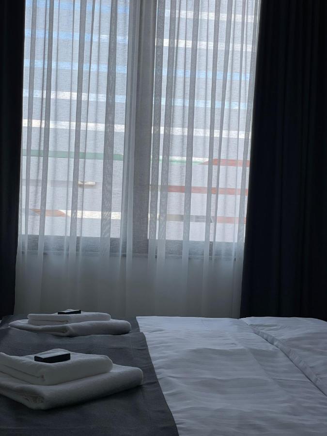 Morpheus Apartmani สเรมสกา มิโตรวิตซา ภายนอก รูปภาพ