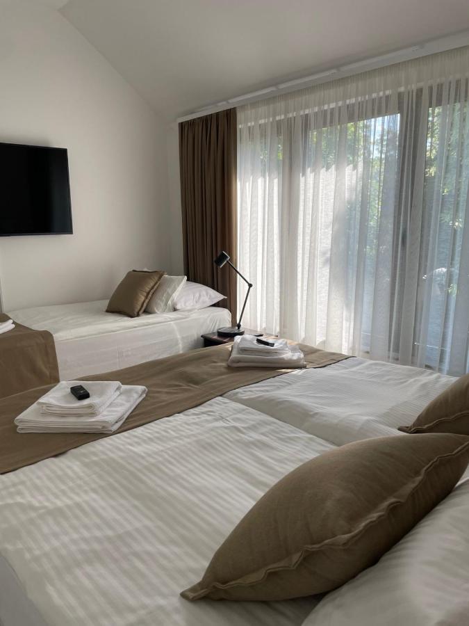 Morpheus Apartmani สเรมสกา มิโตรวิตซา ภายนอก รูปภาพ