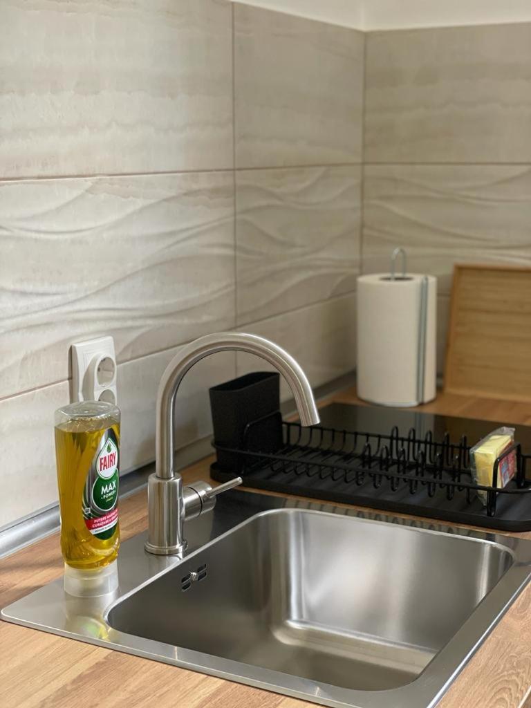 Morpheus Apartmani สเรมสกา มิโตรวิตซา ภายนอก รูปภาพ